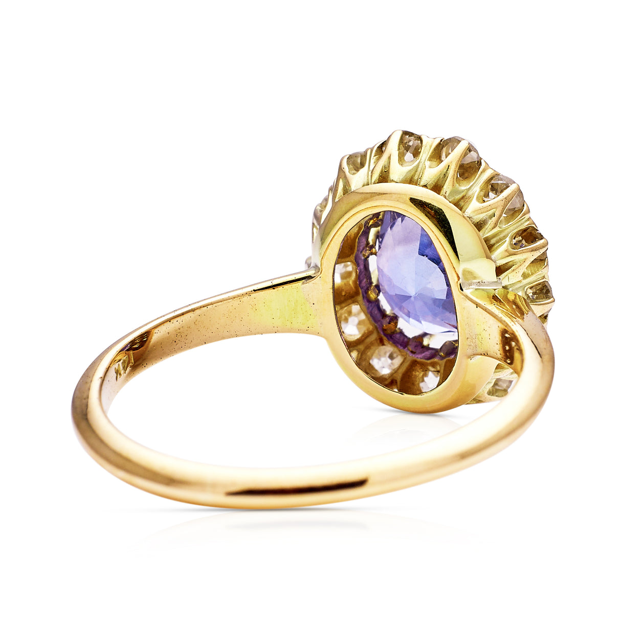 Antique, colour change oval sapphire and diamond cluster engagement ring