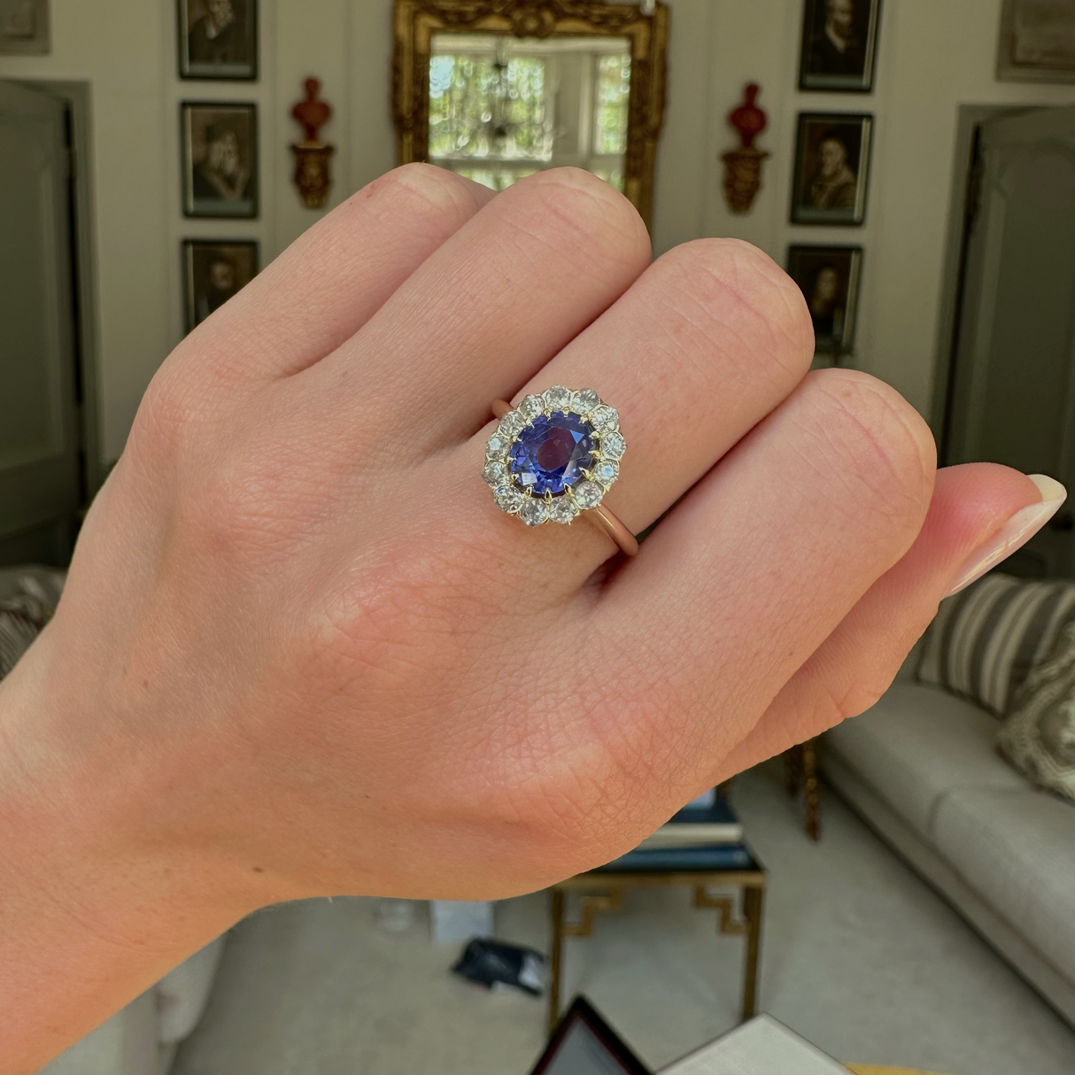 Antique, colour change oval sapphire and diamond cluster engagement ring