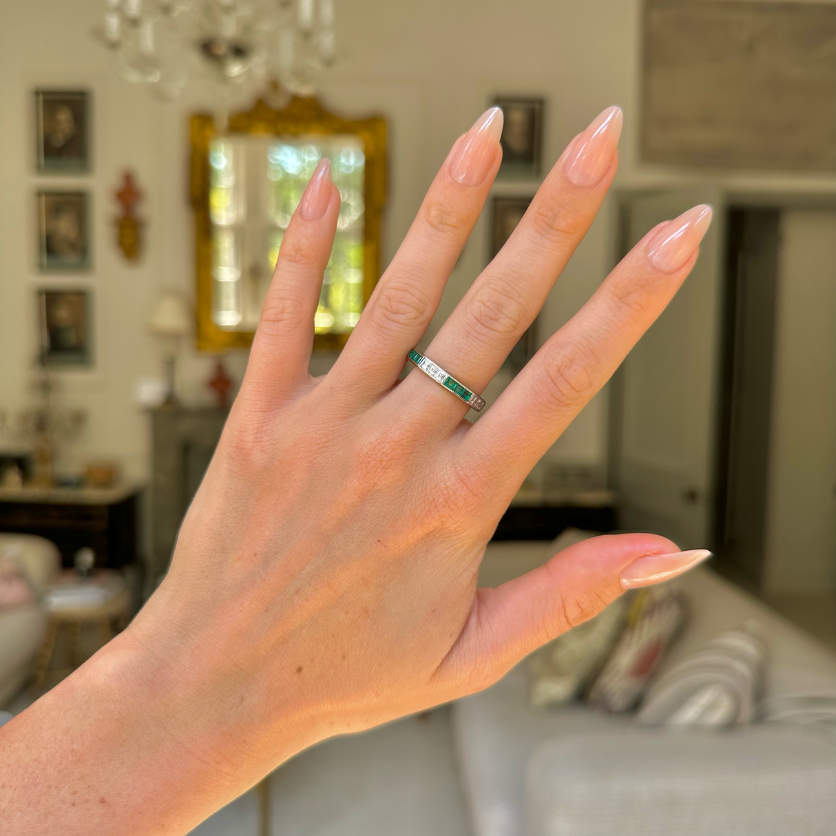 Emerald & diamond half-eternity ring