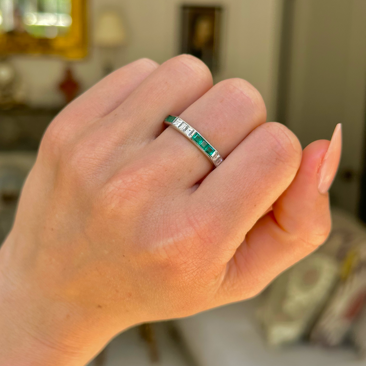 Emerald & diamond half-eternity ring