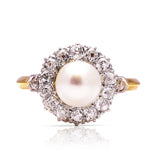 Antique pearl and diamond cluster ring, front view. 