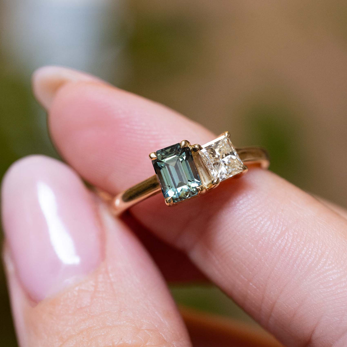 Antique-inspired teal sapphire and diamond Toi et Moi engagement ring in yellow gold