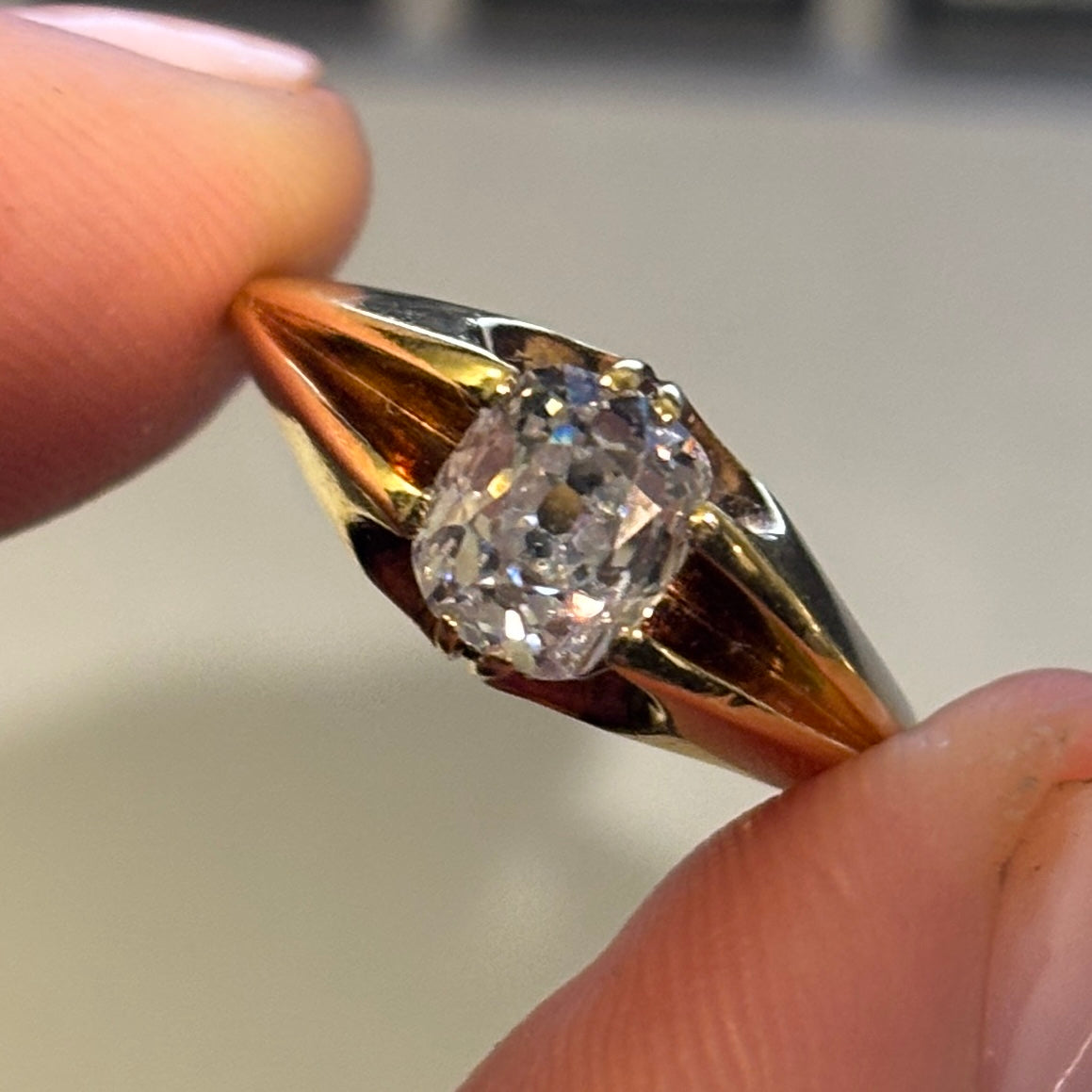 Antique, Victorian old-mine cushion cut diamond solitaire ring