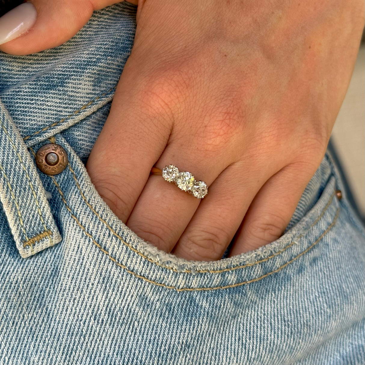 Edwardian, three stone 1.75ct diamond engagement ring, 18ct yellow gold