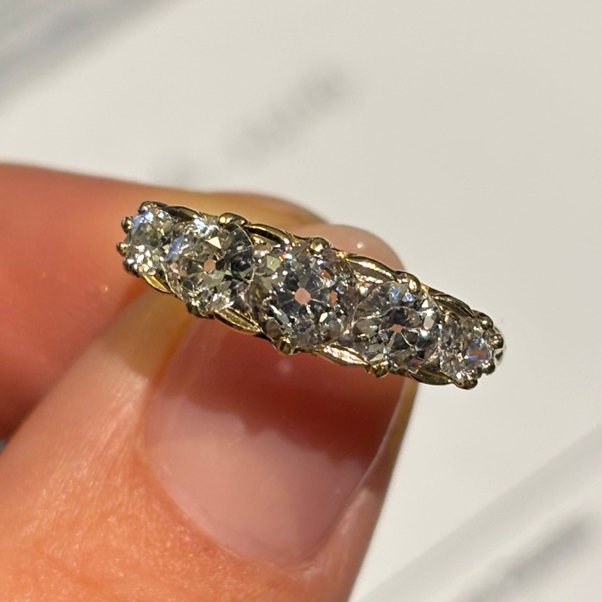 Antique, Edwardian diamond half-hoop ring