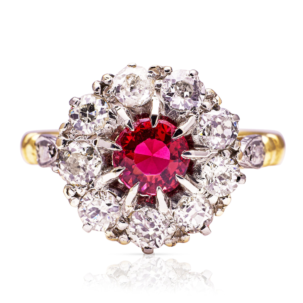 Vintage ruby and diamond cluster ring, front view.