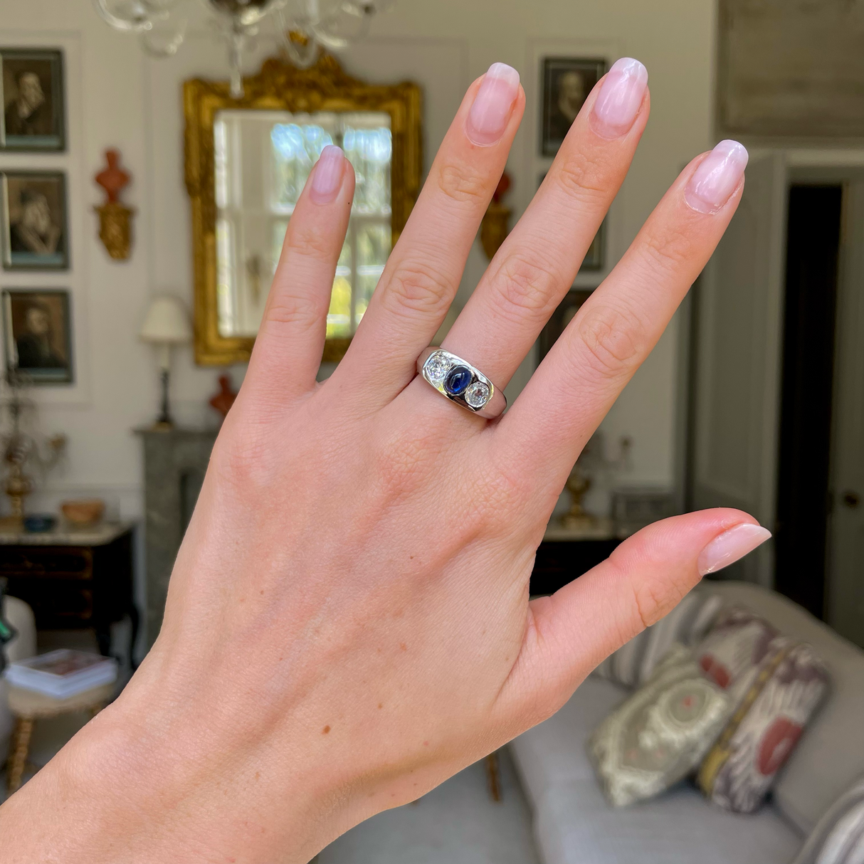 1920s cabochon sapphire and diamond three stone gypsy ring, platinum