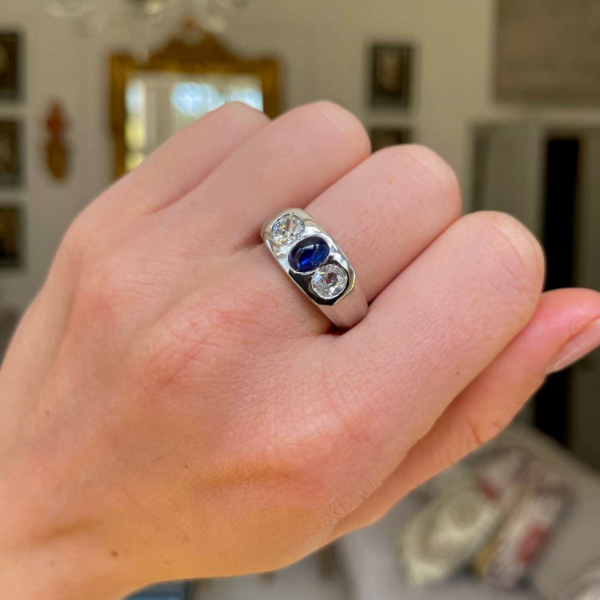 1920s cabochon sapphire and diamond three stone gypsy ring, platinum
