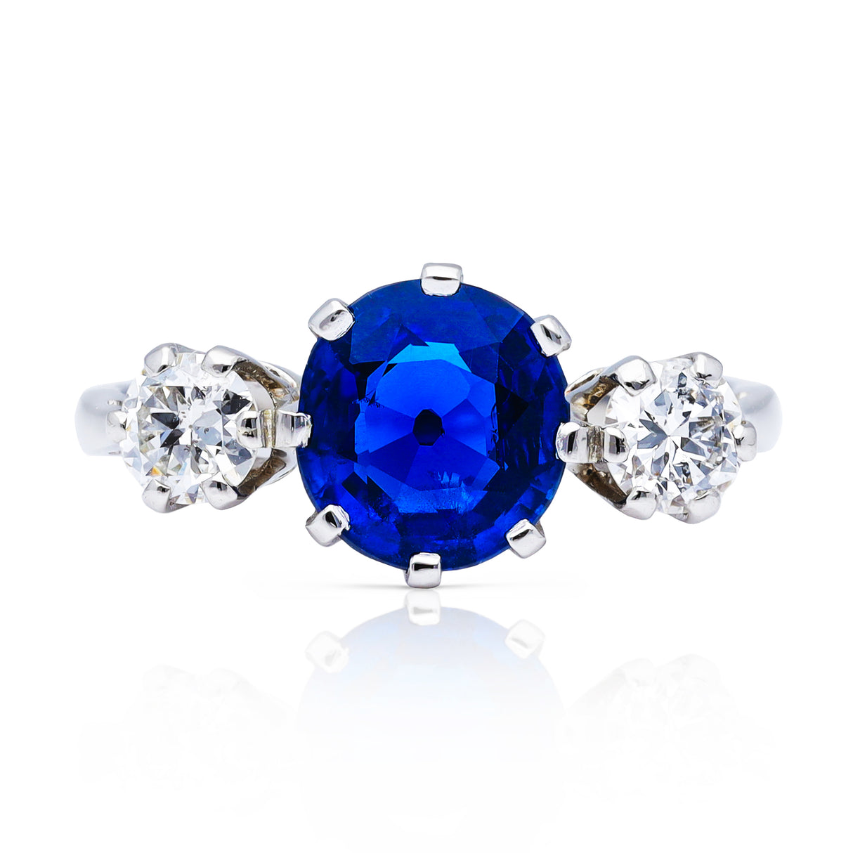 Burma blue sapphire & diamond three-stone engagement ring, platinum