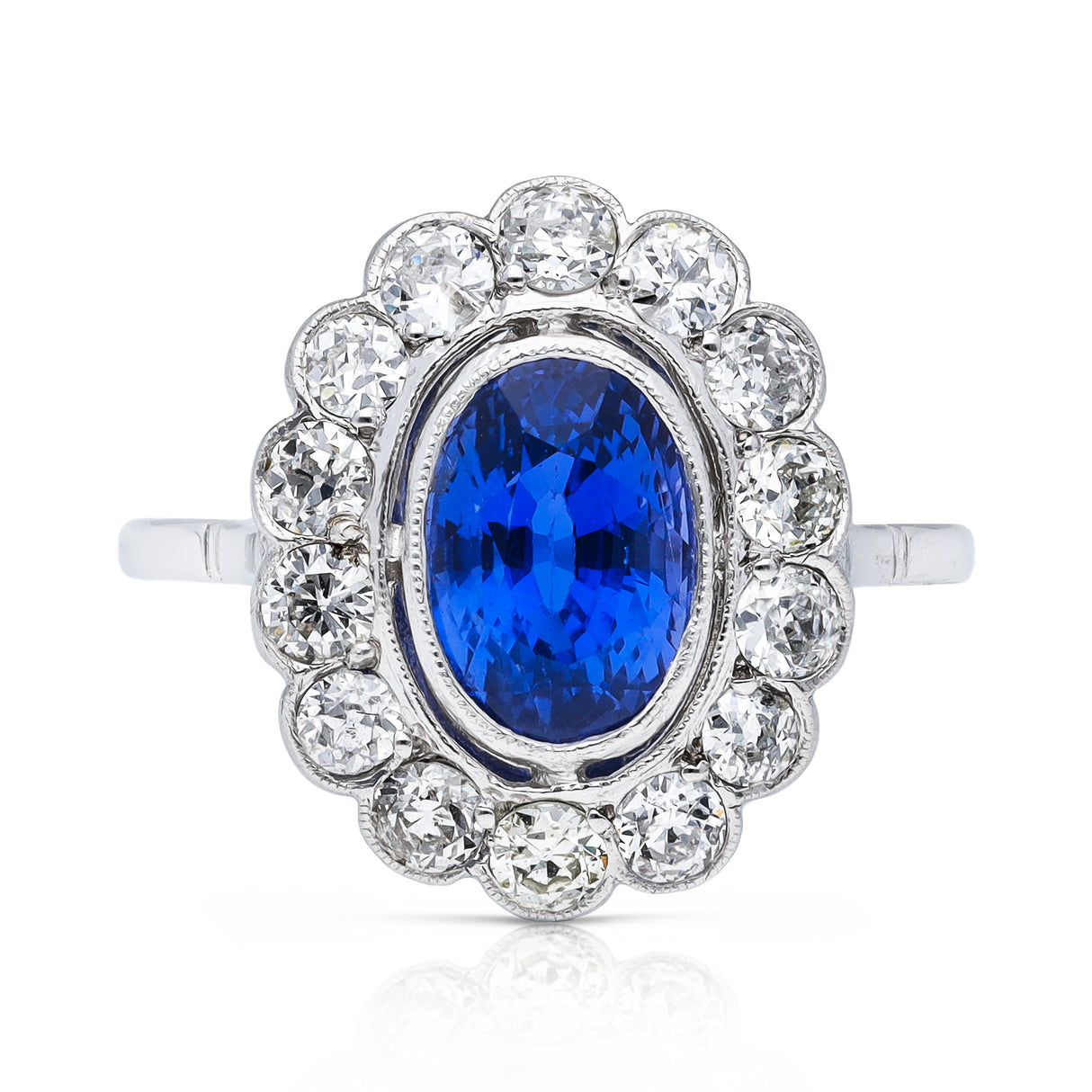 2.5ct oval blue sapphire and diamond cluster ring, 18ct white gold