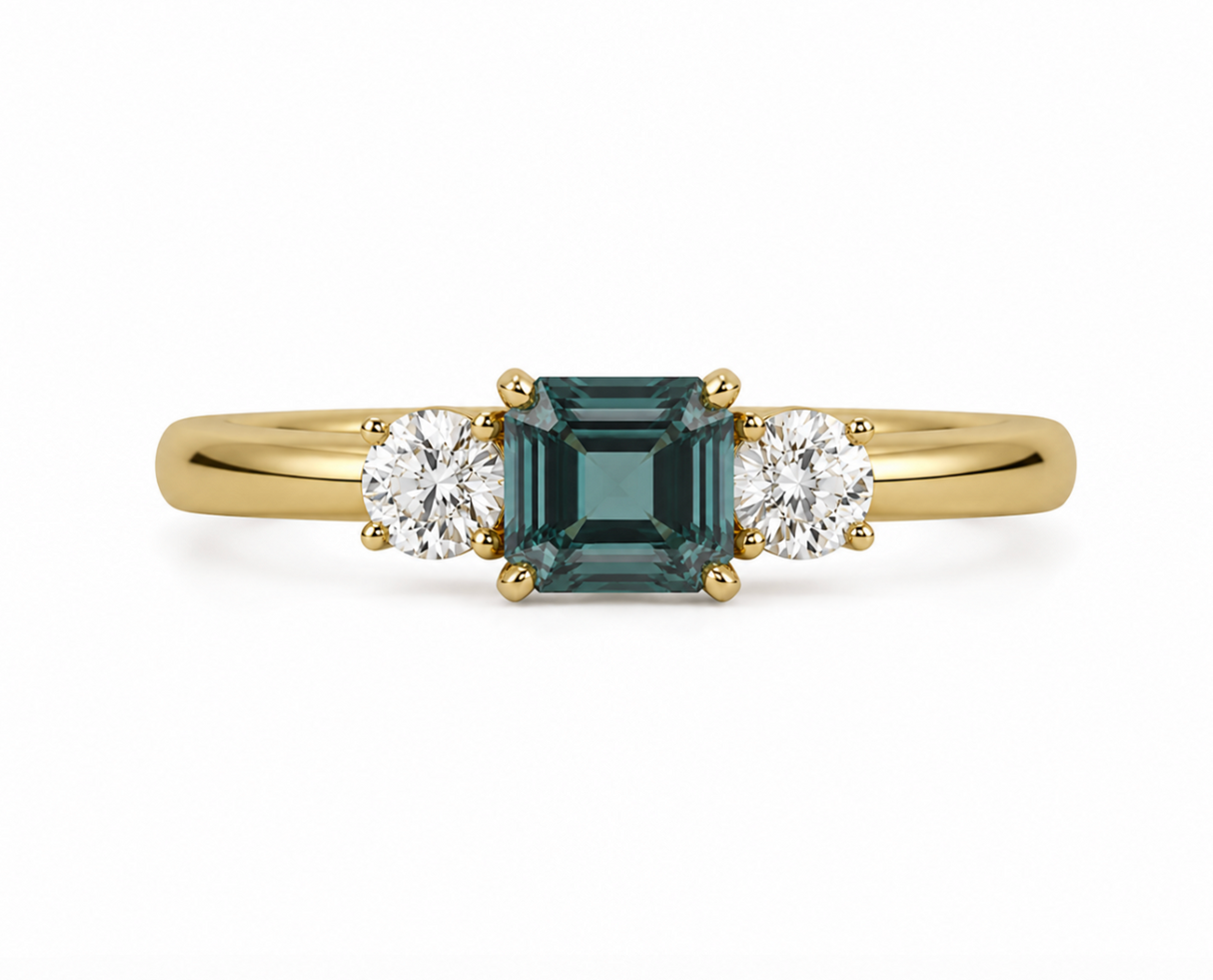 Antique-inspired, teal octagon-cut sapphire & diamond three-stone engagement ring
