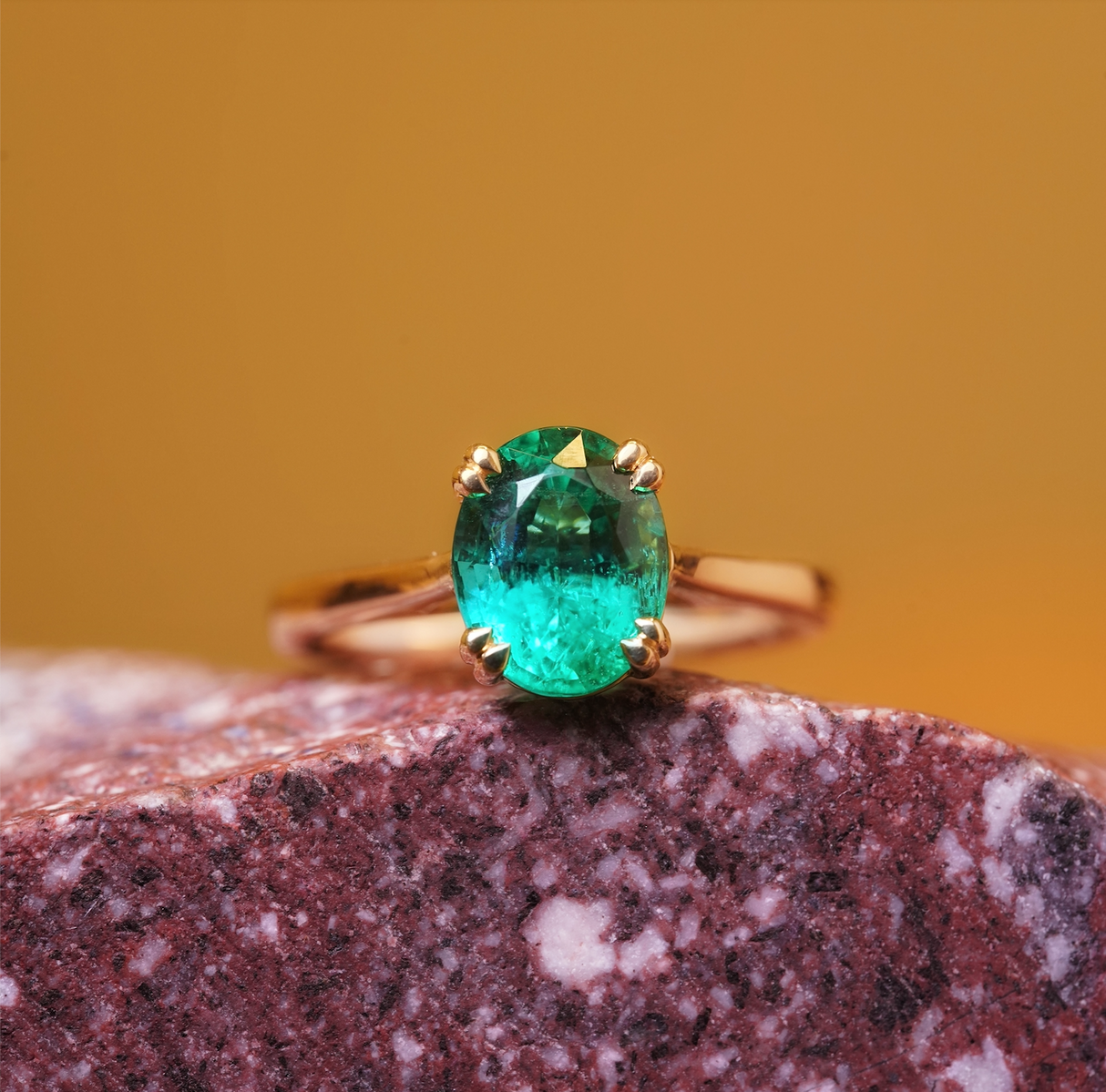 Oval-cut 2ct emerald single-stone ring