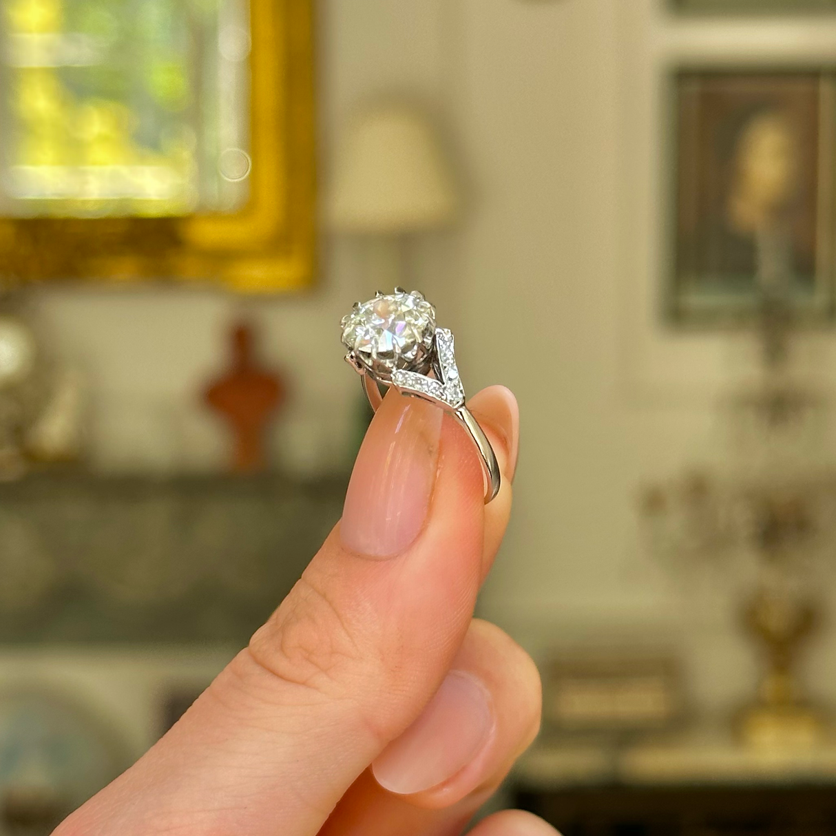 Antique, 2.2ct round-cut diamond solitaire engagement ring, platinum