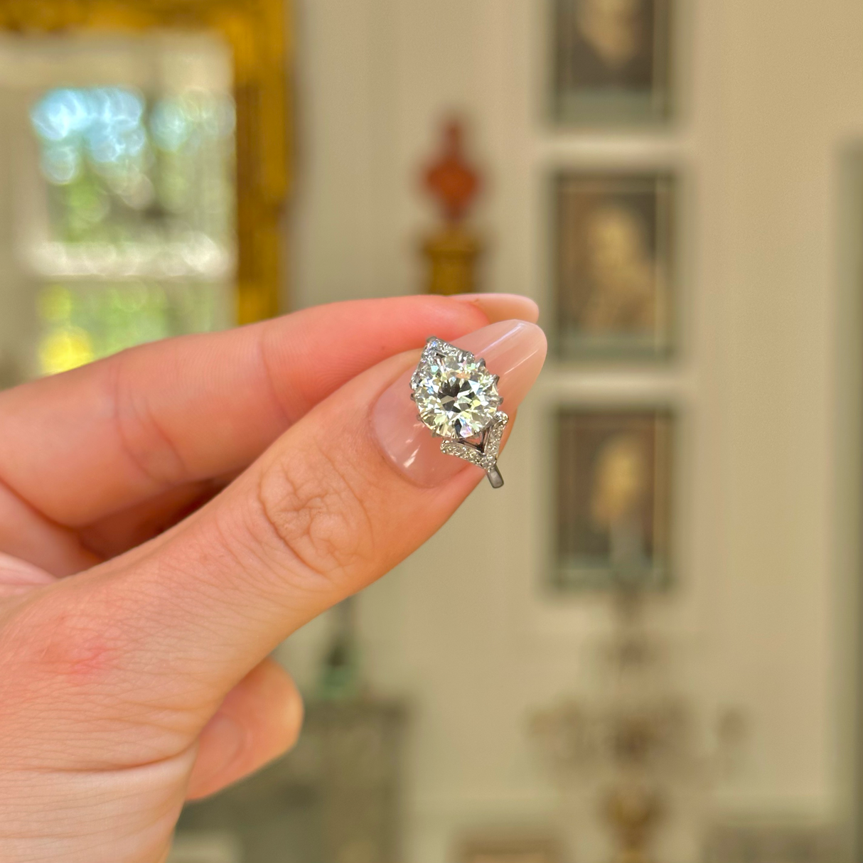 Antique, 2.2ct round-cut diamond solitaire engagement ring, platinum