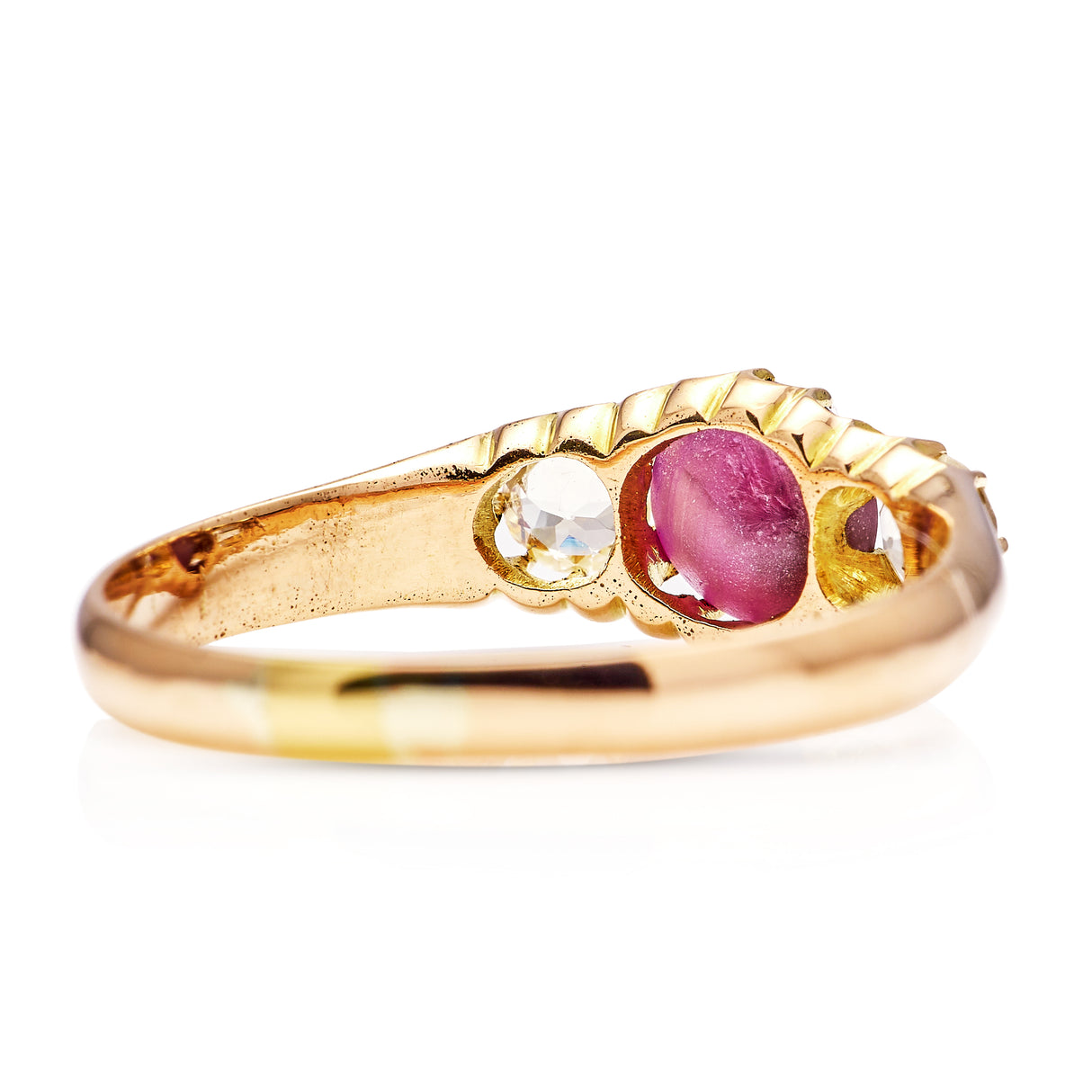 Antique, Edwardian cabochon star ruby and white sapphire three-stone ring