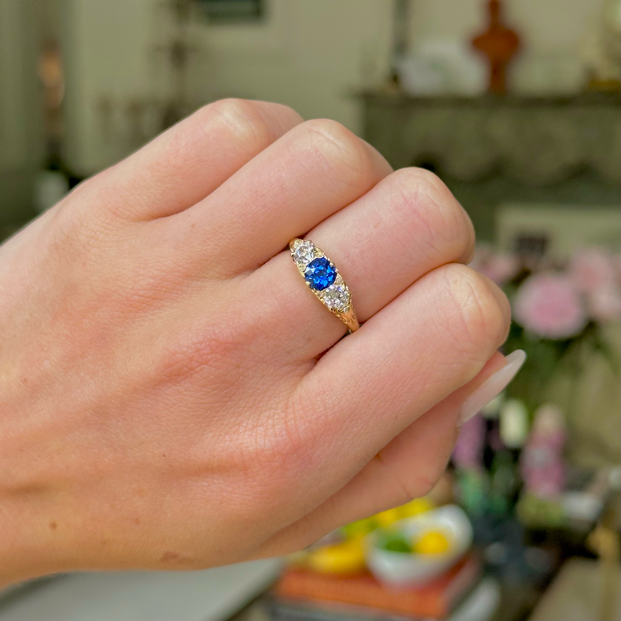 Antique, Edwardian, sapphire and diamond, carved three stone engagement ring, 18ct yellow gold