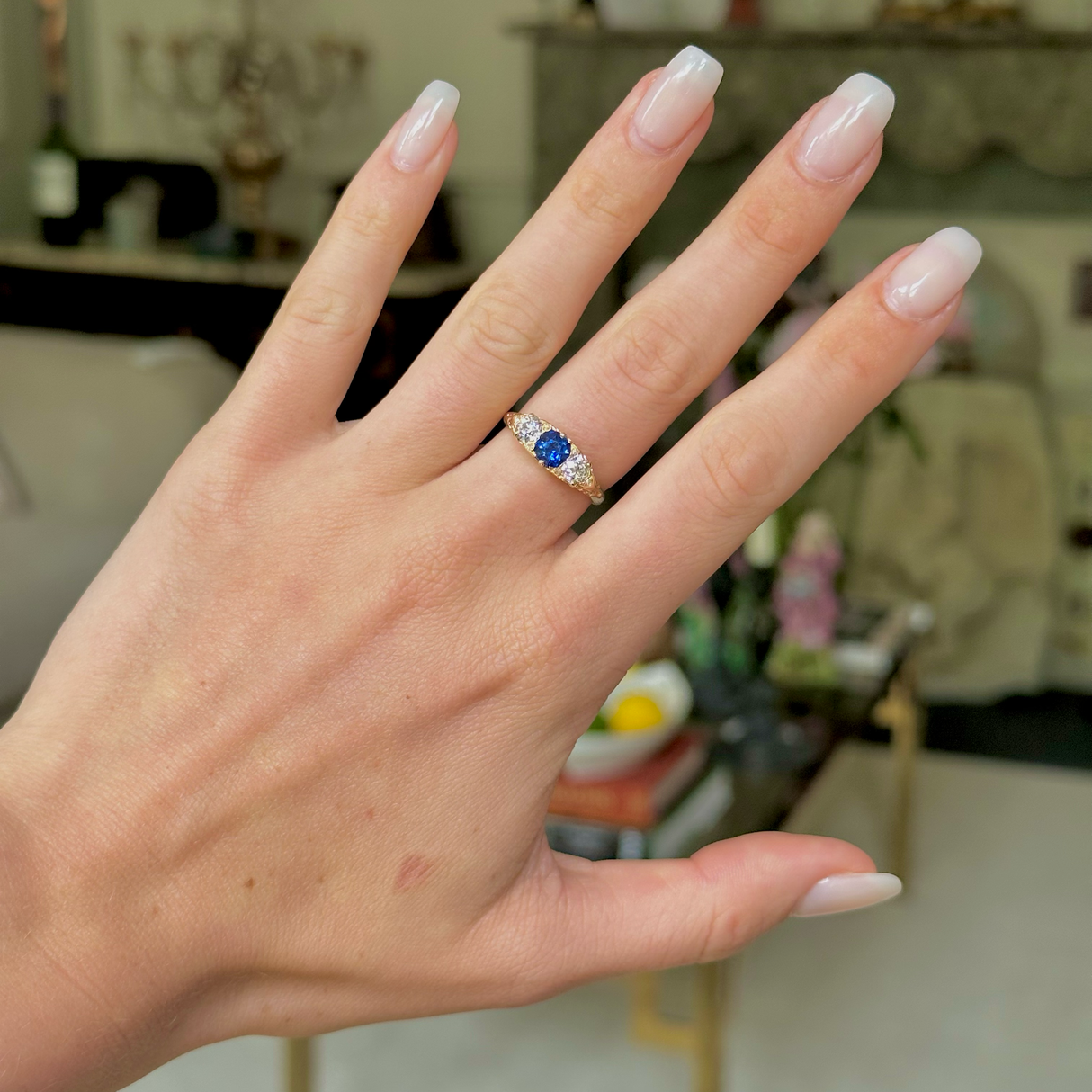 Antique, Edwardian, sapphire and diamond, carved three stone engagement ring, 18ct yellow gold