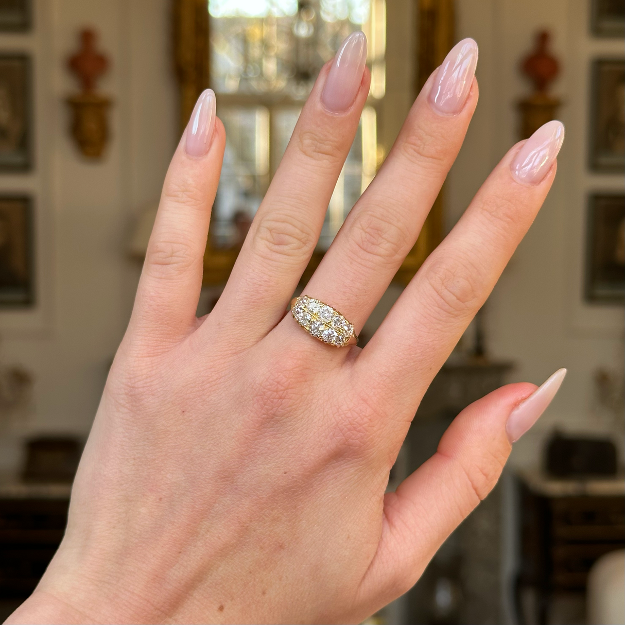 victorian double row diamond band worn on hand. Victorian double row diamond band worn on hand.