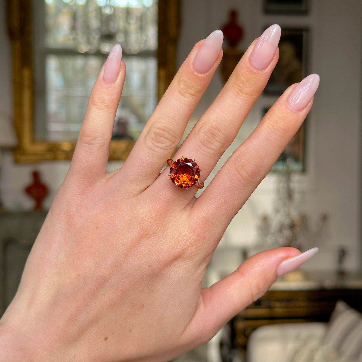 vintage citrine and 18ct yellow gold cocktail ring worn on hand.