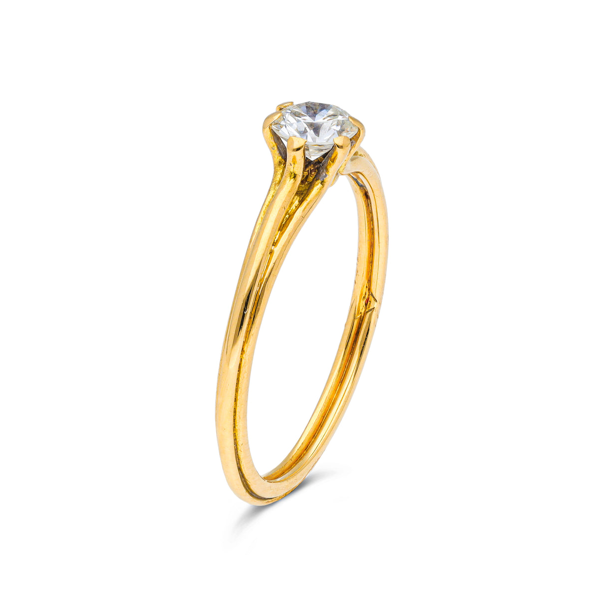 Vintage solitaire diamond engagement ring, side view.