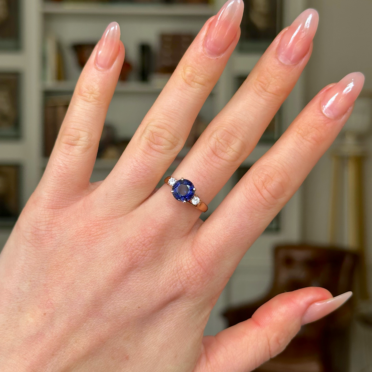 Vintage Iolite and Diamond Three-Stone Engagement Ring, 18ct Yellow Gold worn on hand.