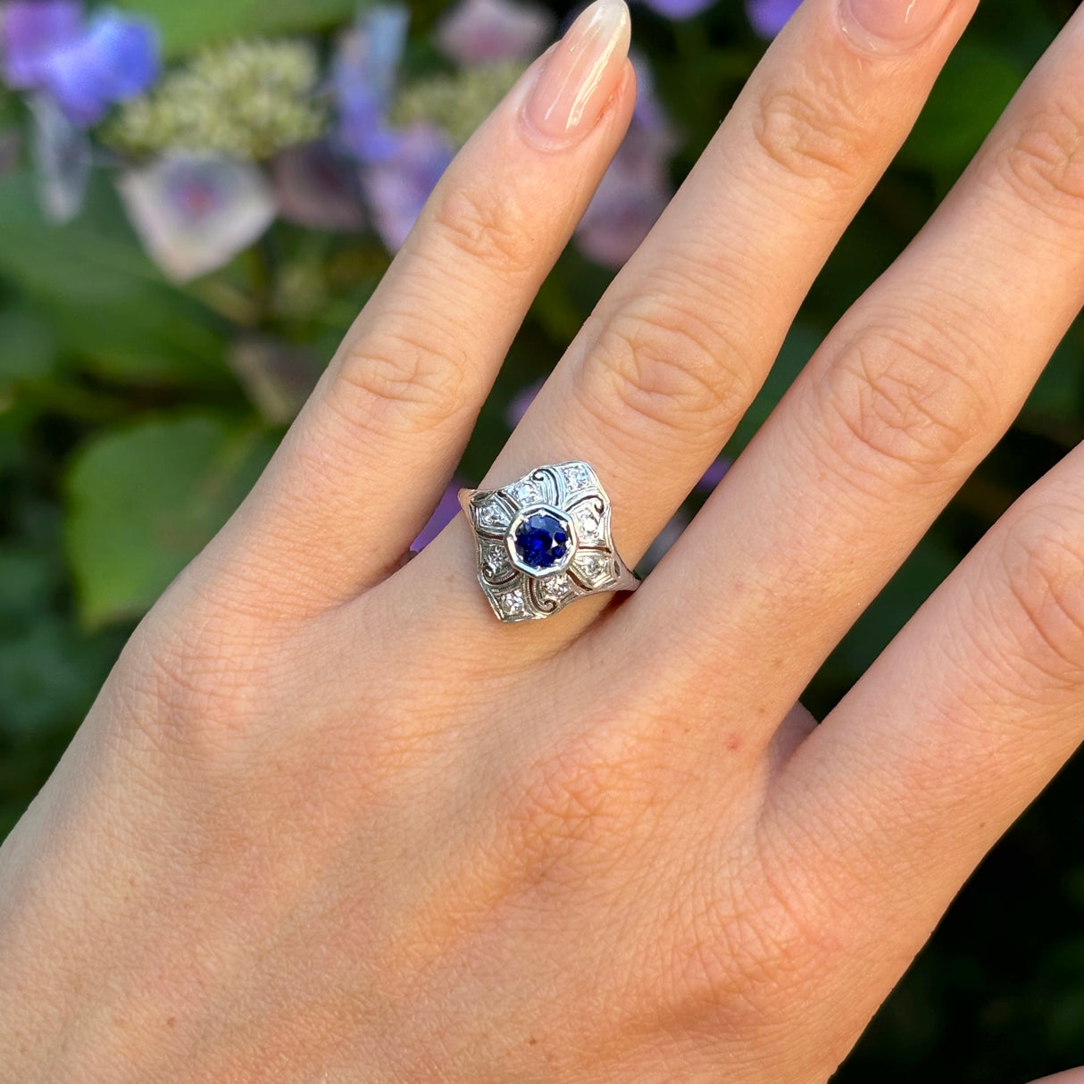 Vintage, 1930s sapphire and diamond ring worn on hand