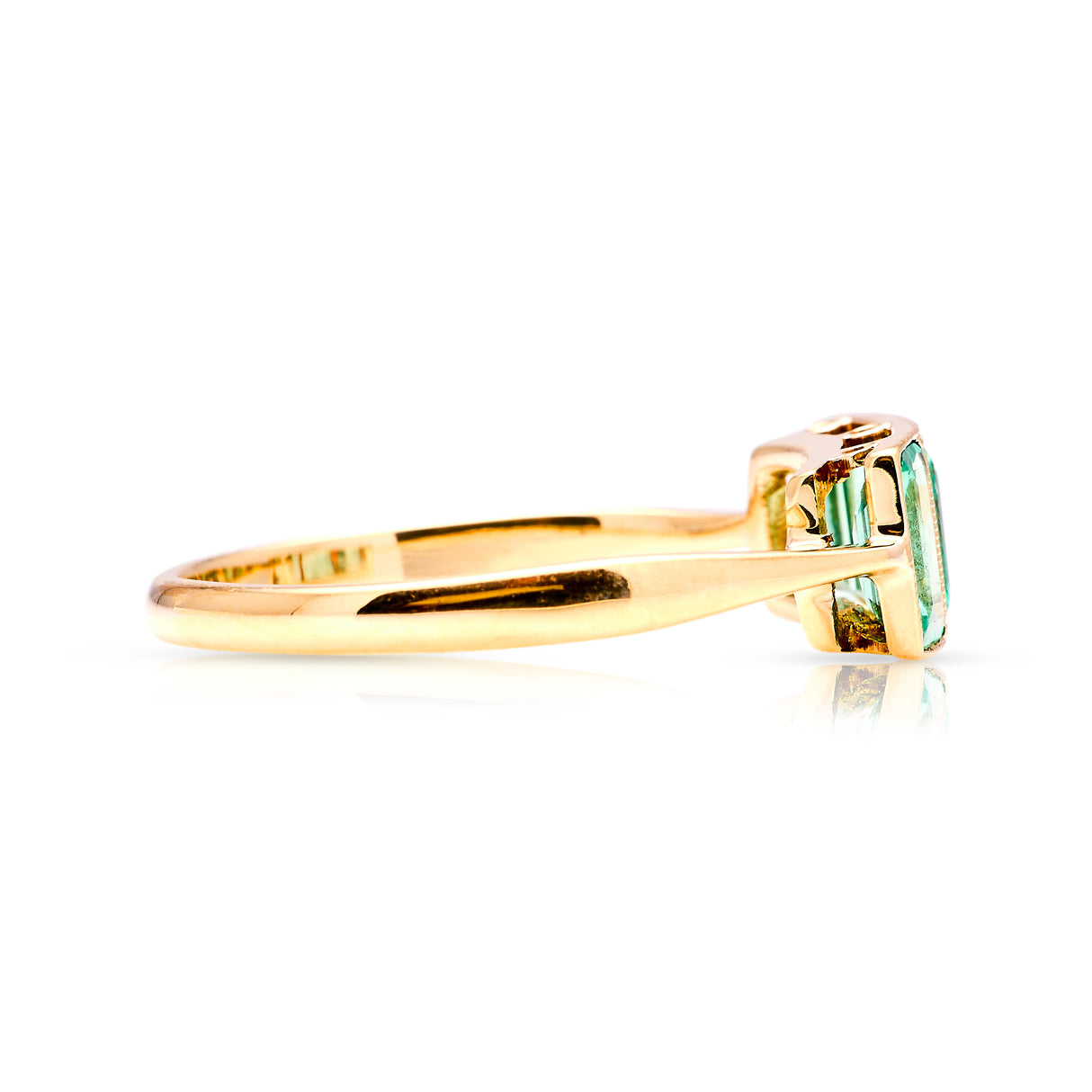 Vintage, 1930s three-stone emerald ring side view