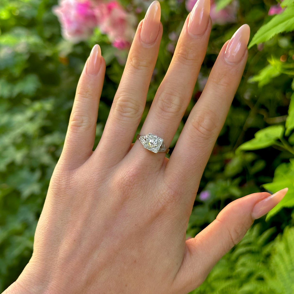 Vintage, 1940s Diamond Engagement Ring 18ct White Gold and Platinum worn on hand.