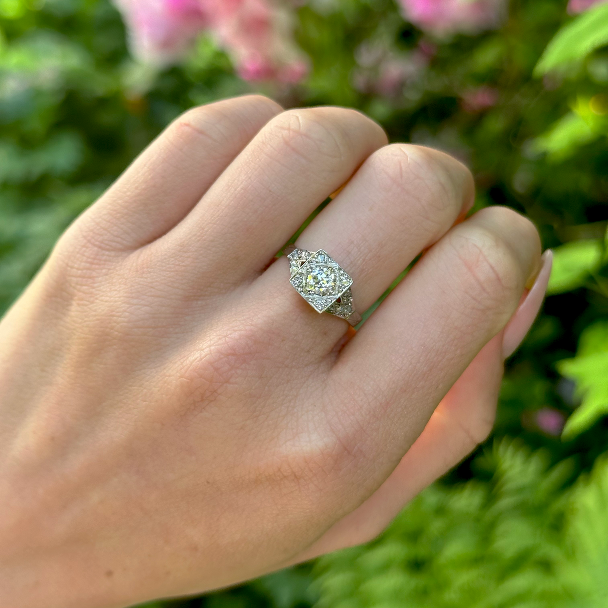 Vintage, 1940s Diamond Engagement Ring 18ct White Gold and Platinum worn on hand.