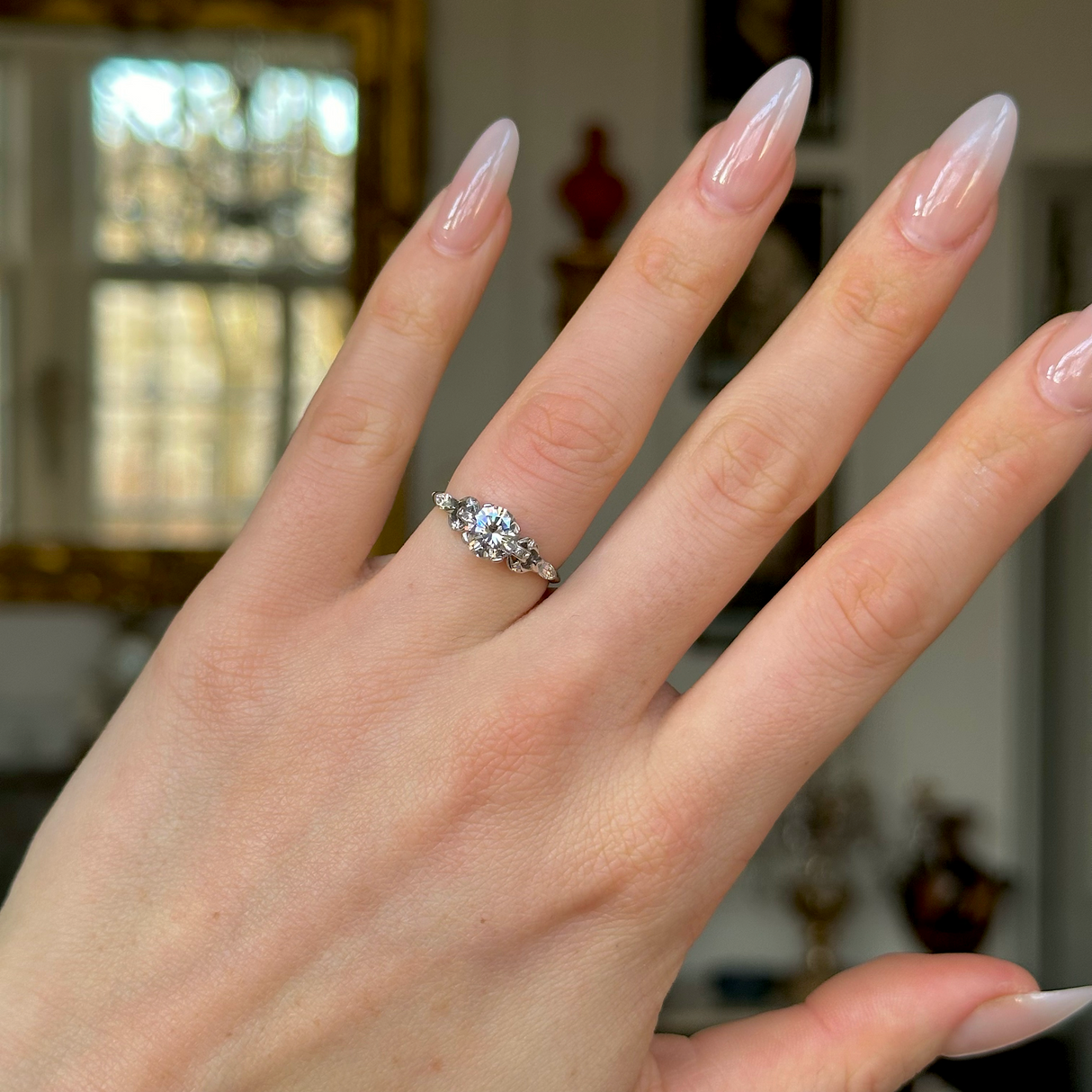 Vintage, 1950s Diamond Engagement Ring, 14ct White Gold and Platinum worn on hand.