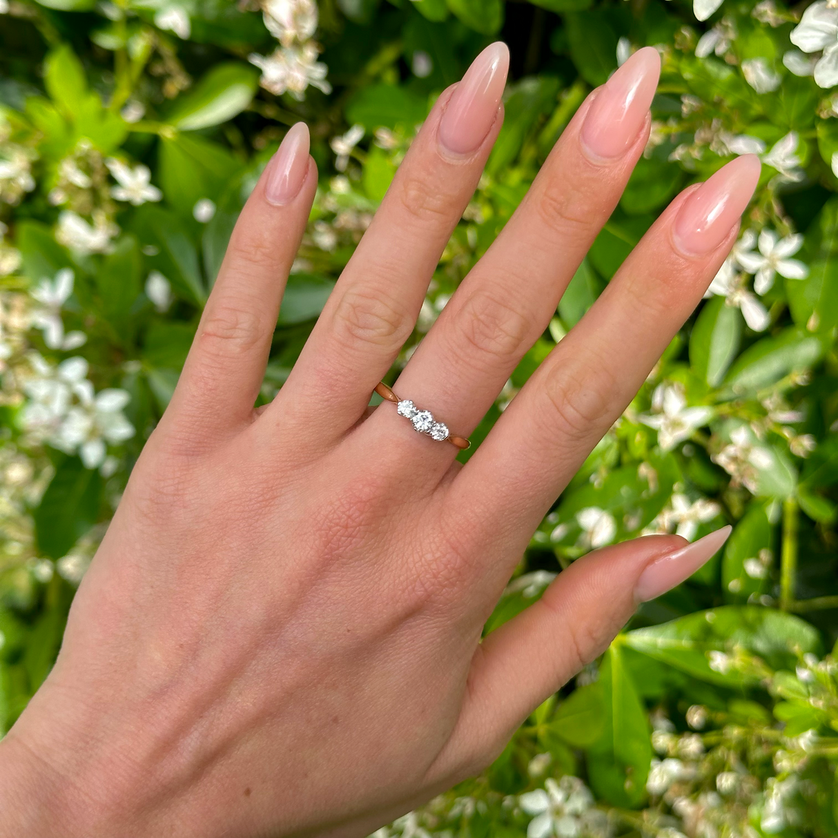 Vintage, 1950s Three-Stone Diamond Engagement Ring, 18ct Yellow Gold and Platinum worn on hand.