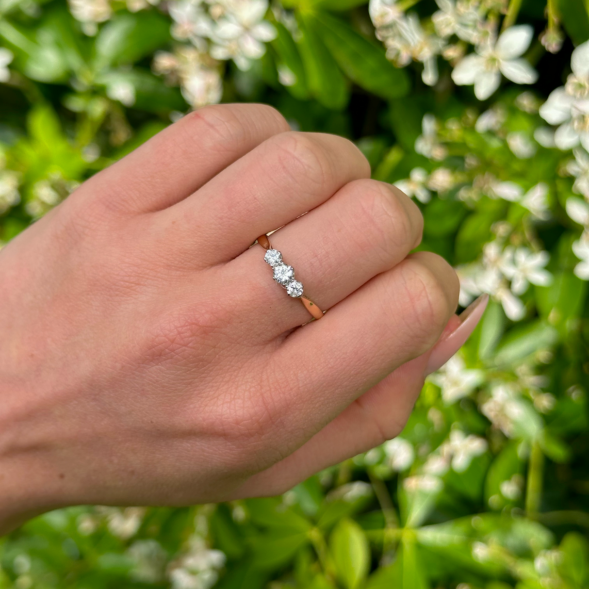 Vintage, 1950s Three-Stone Diamond Engagement Ring, 18ct Yellow Gold and Platinum worn on hand.