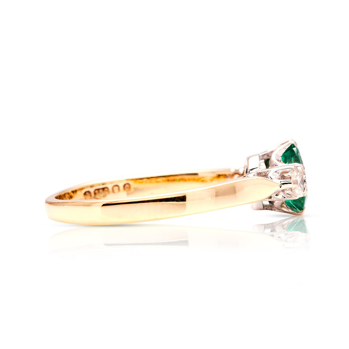 Vintage, 1970s emerald & diamond three-stone ring side view