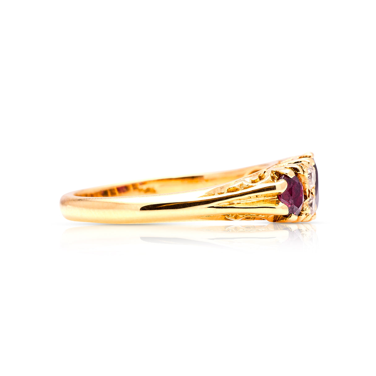 Vintage, 1970s ruby & diamond three-stone ring side view