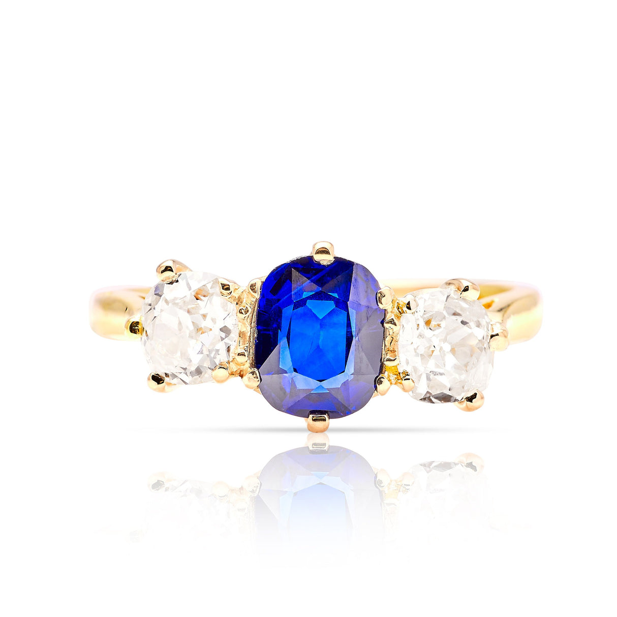 Vintage, 1980s sapphire and diamond three-stone ring front view