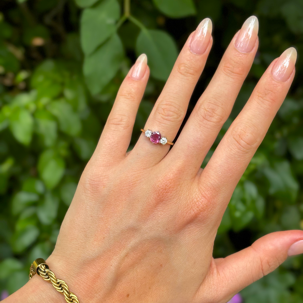 Vintage, 1990s pink sapphire and diamond three-stone ring, 18ct yellow gold and platinum