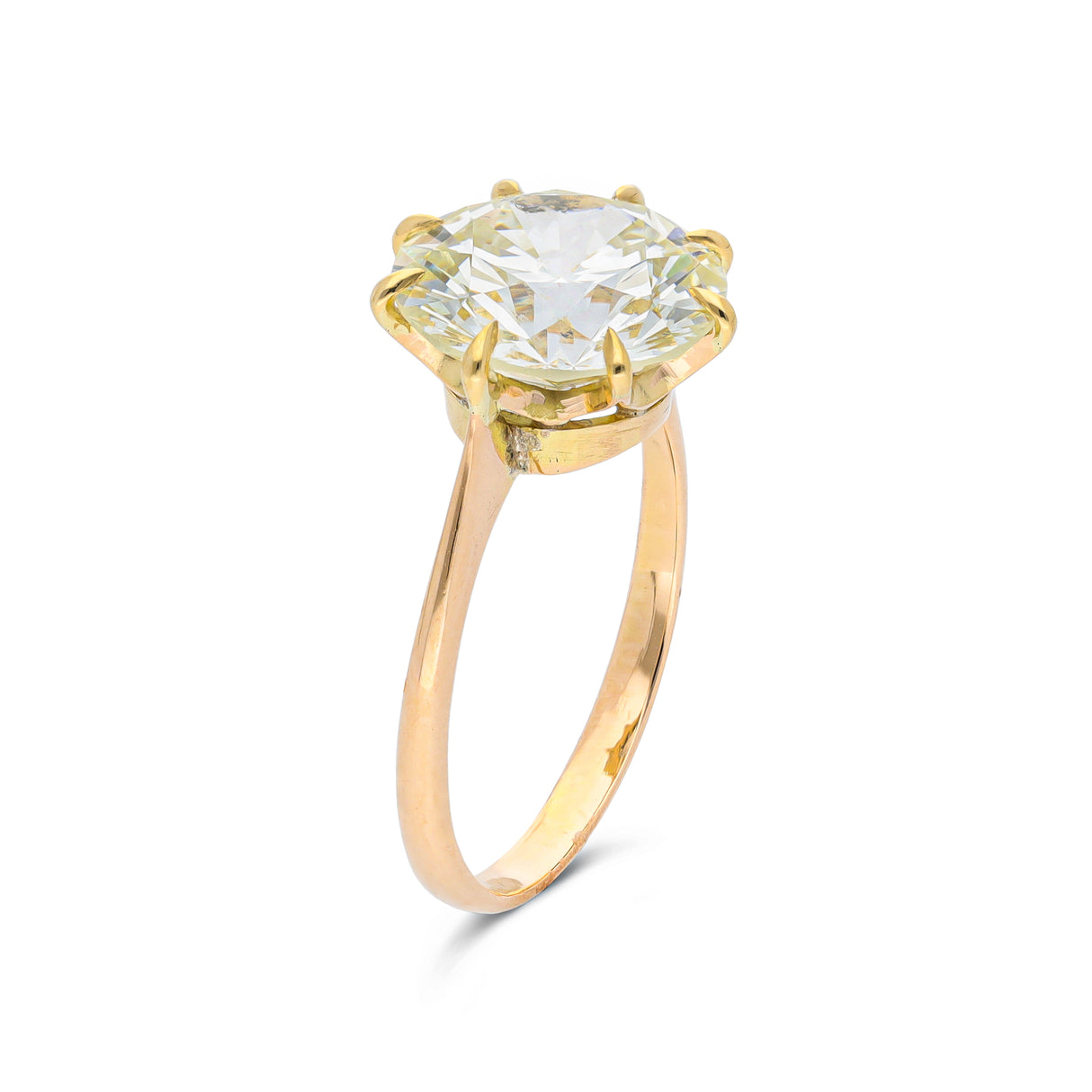 Vintage solitaire diamond engagement ring, side view.