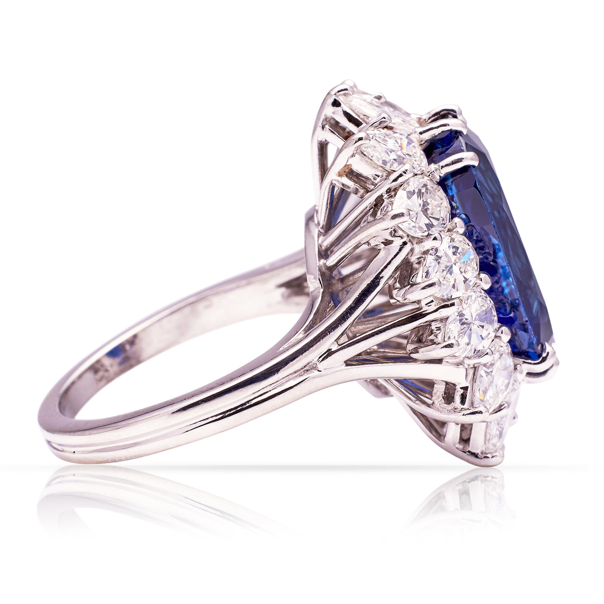 Vintage sapphire and diamond cluster ring, side view.