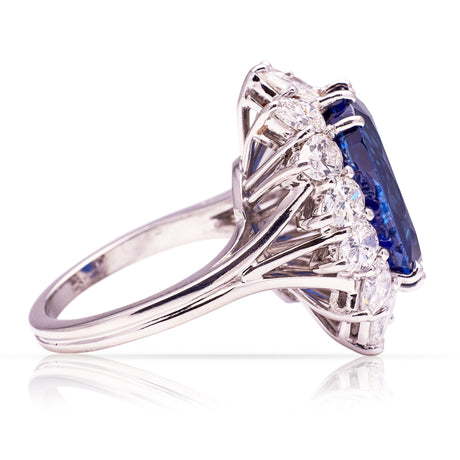 Vintage sapphire and diamond cluster ring, side view.