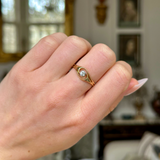 Vintage Art Deco twist ring, worn on closed hand.