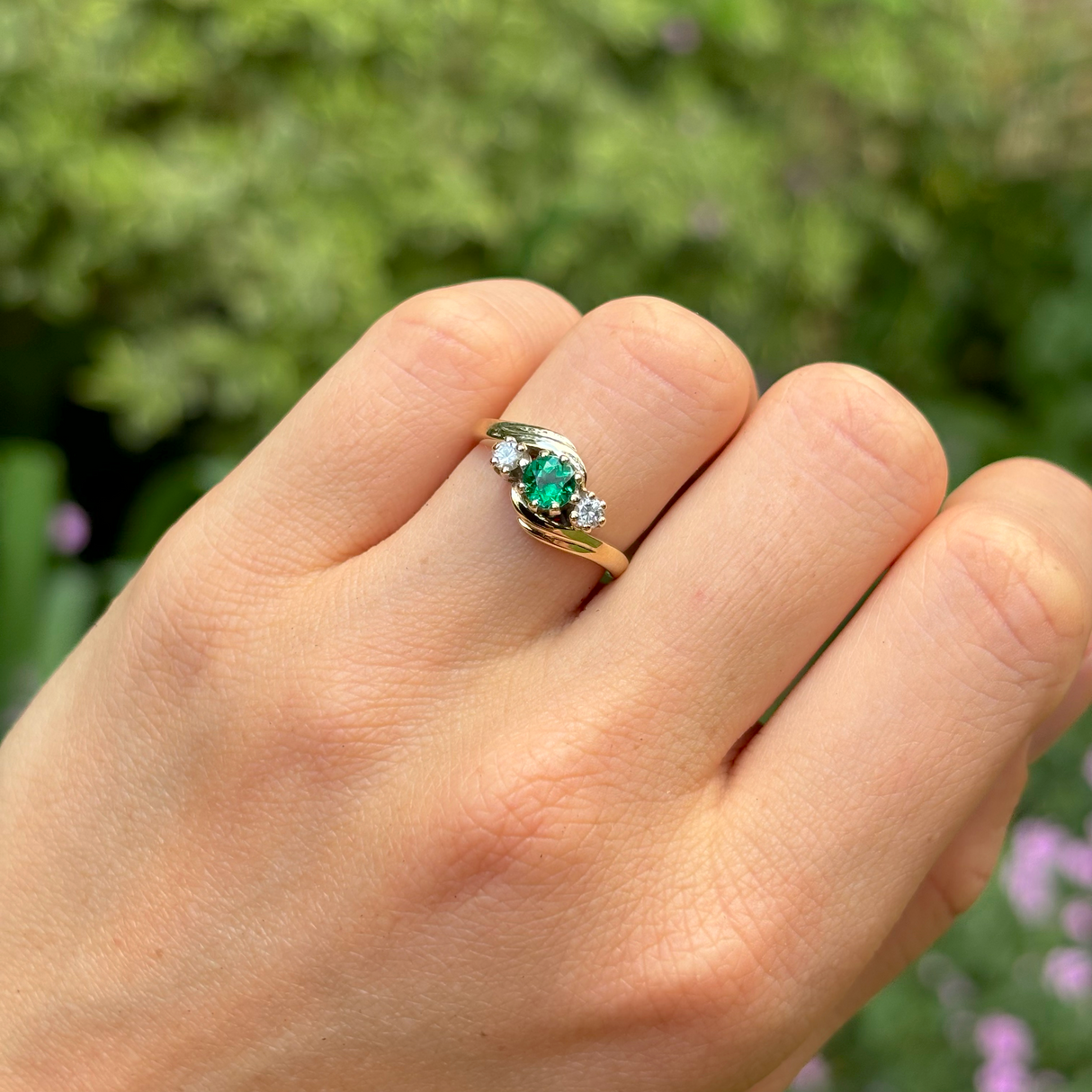 Vintage, Art Deco emerald & diamond three-stone ring, 9ct yellow gold worn on hand.