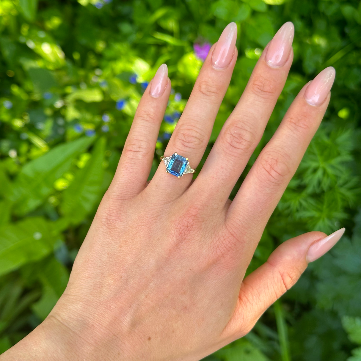 Vintage, Blue Sapphire and Trilliant-cut Diamond Three Stone ring, 18ct Yellow Gold worn on hand