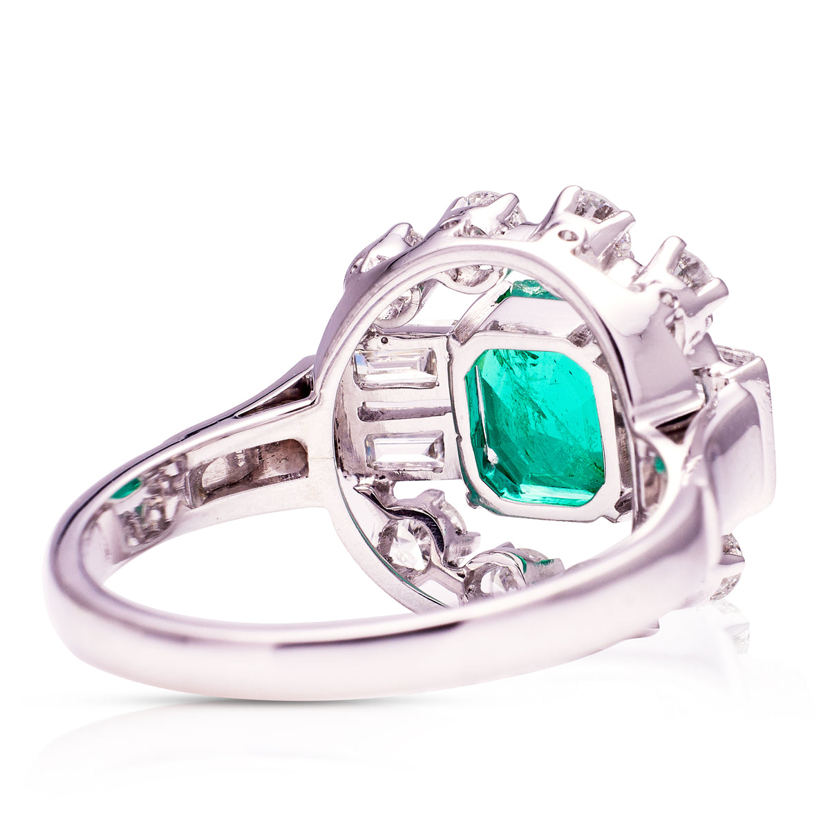 Vintage emerald and diamond cluster ring, rear view.