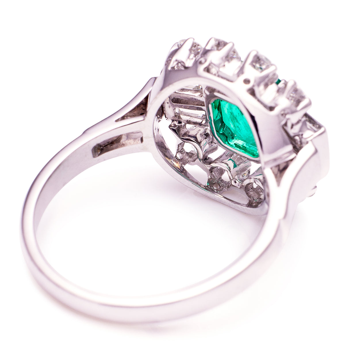 Vintage emerald and diamond cluster ring, rear view.