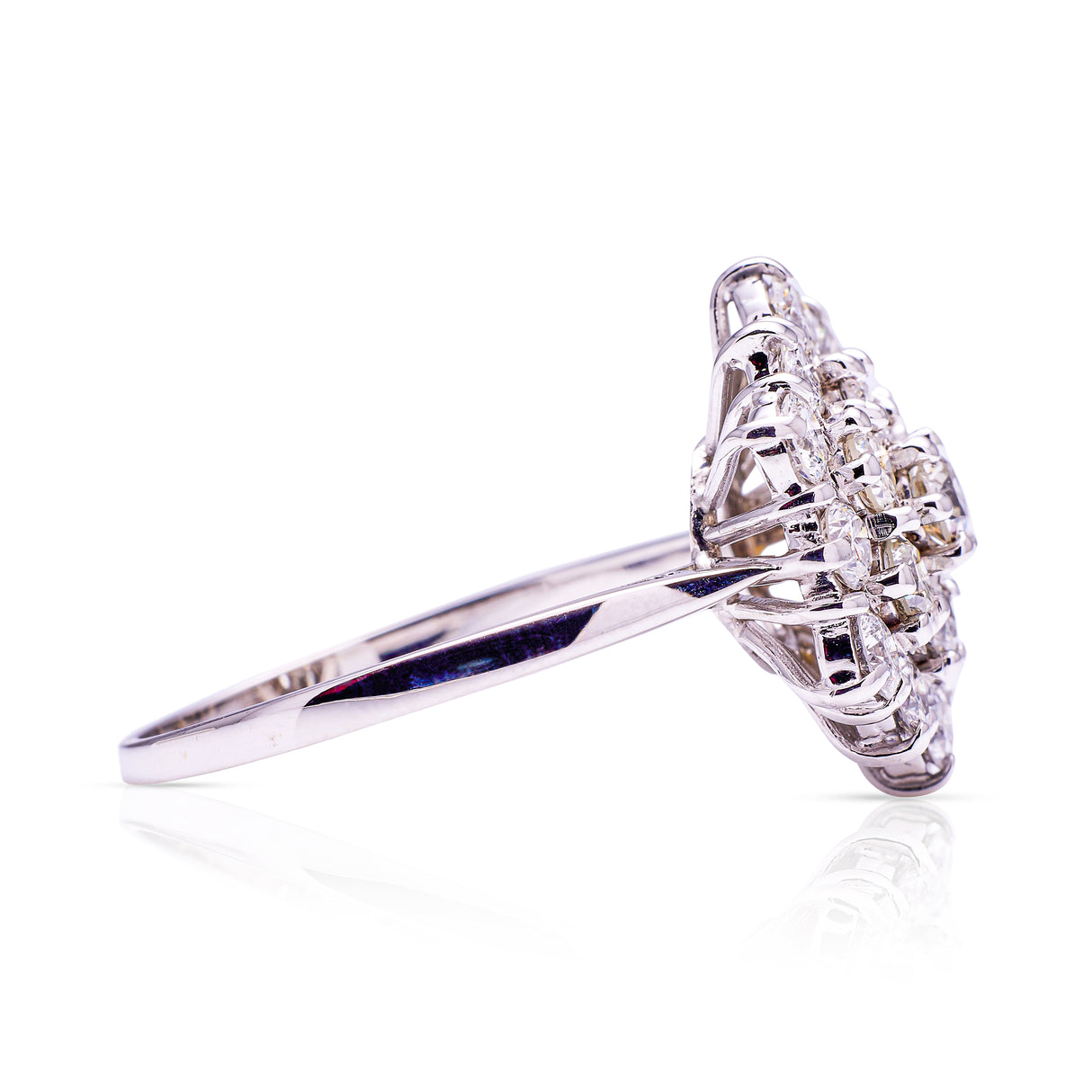 Vintage, large diamond cluster ring, side view.