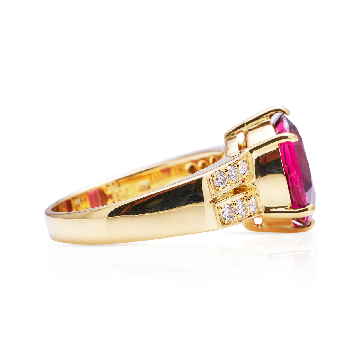 Red tourmaline and diamond cocktail ring, side view.