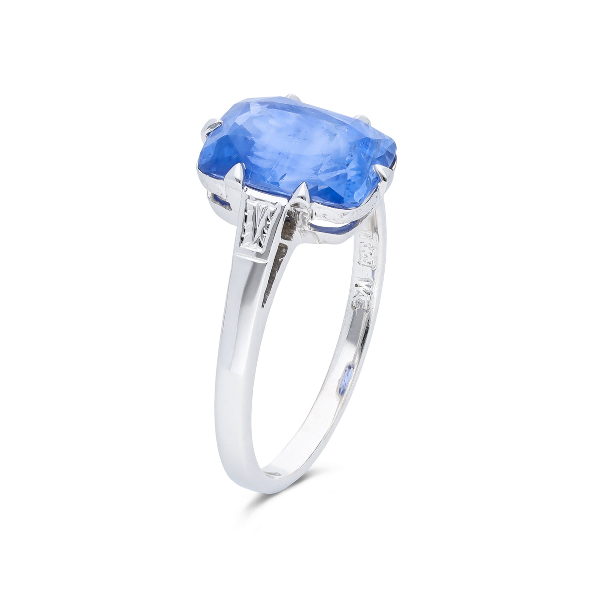 Vintage solitaire sapphire engagement ring, side view.