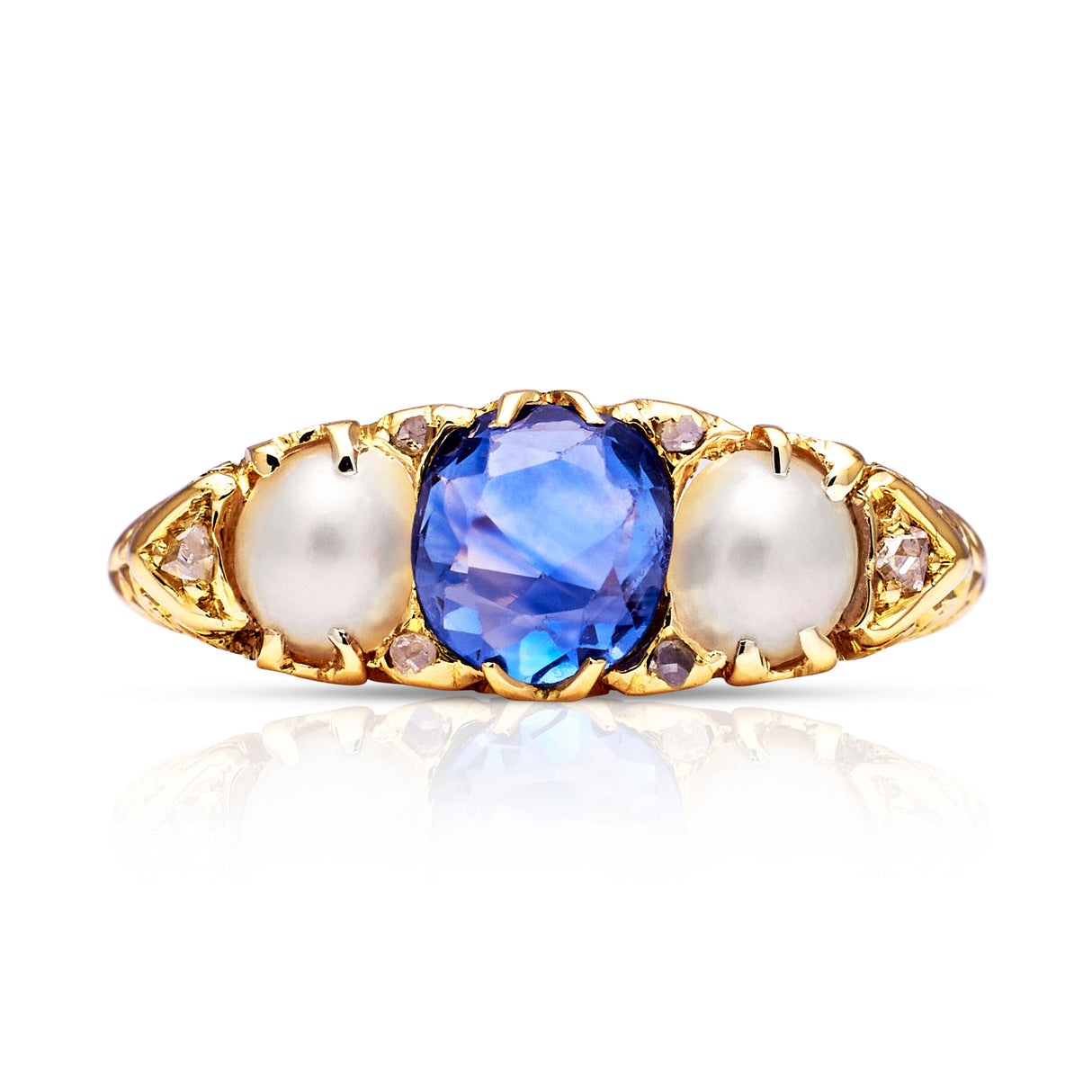 Vintage sapphire and pearl ring, front view.