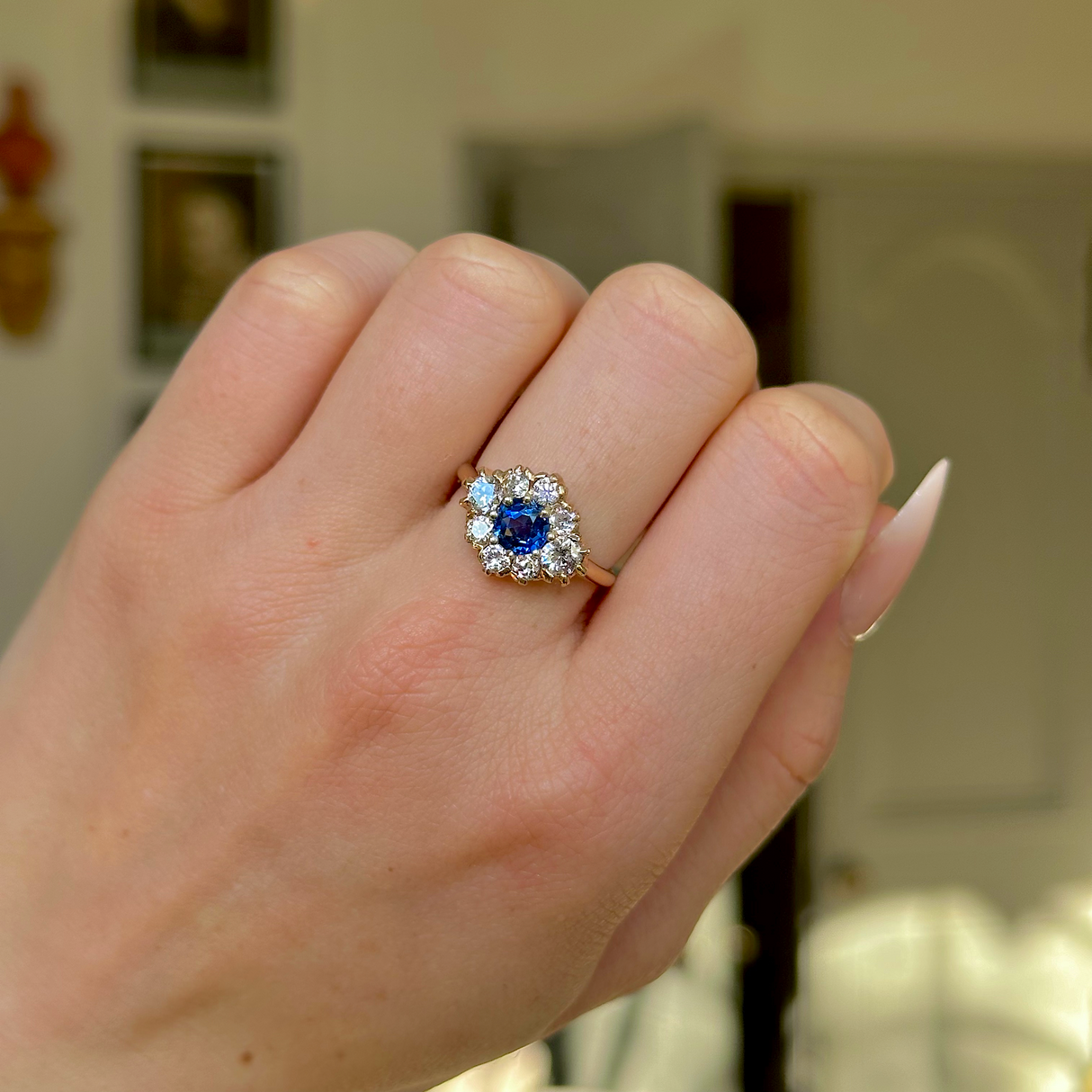Vintage, Sapphire and Diamond Cluster Engagement Ring, 14ct Yellow Gold worn on closed hand