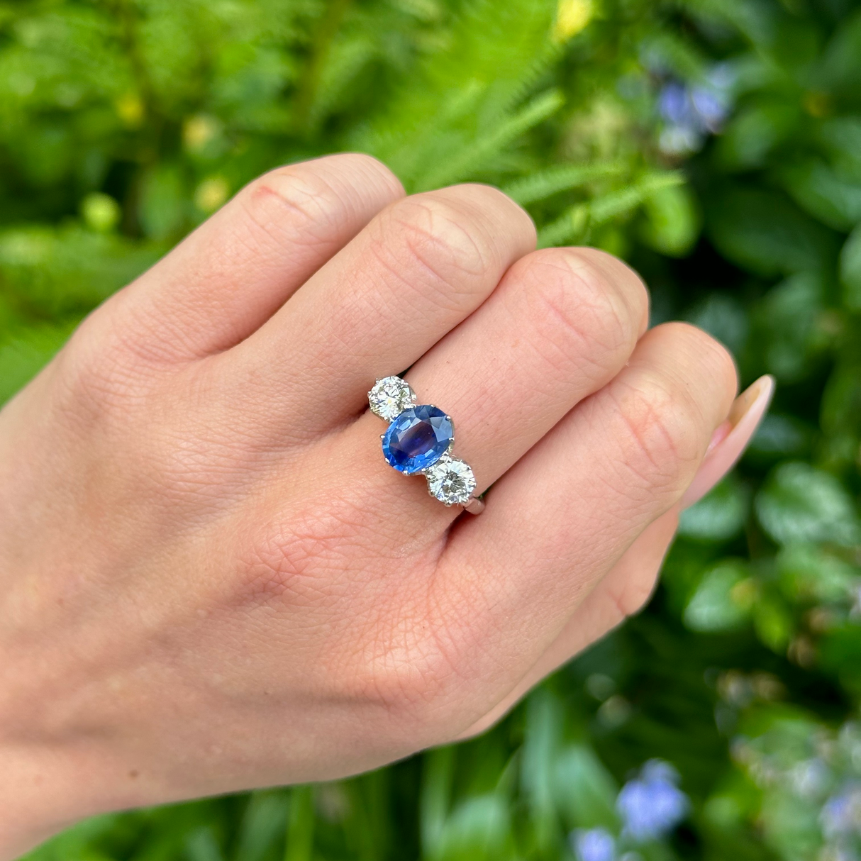 Vintage, Sapphire and Diamond Three-Stone Ring, Platinum worn on hand.